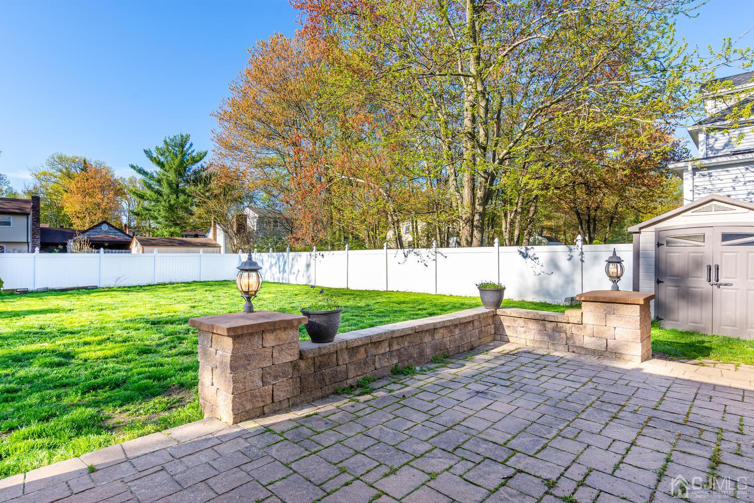 799 New Dover Road Edison, NJ 08820 - Photo 46 of 54 a backyard of a house with lots of green space