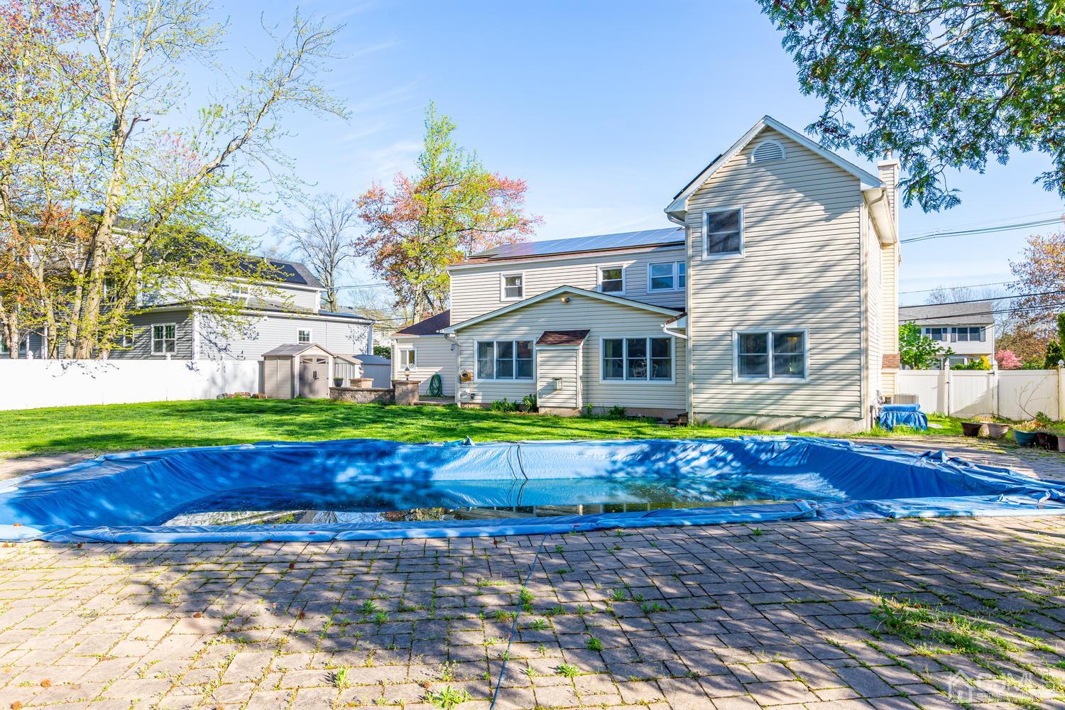 799 New Dover Road Edison, NJ 08820 - Photo 50 of 54 a front view of house with yard and green space