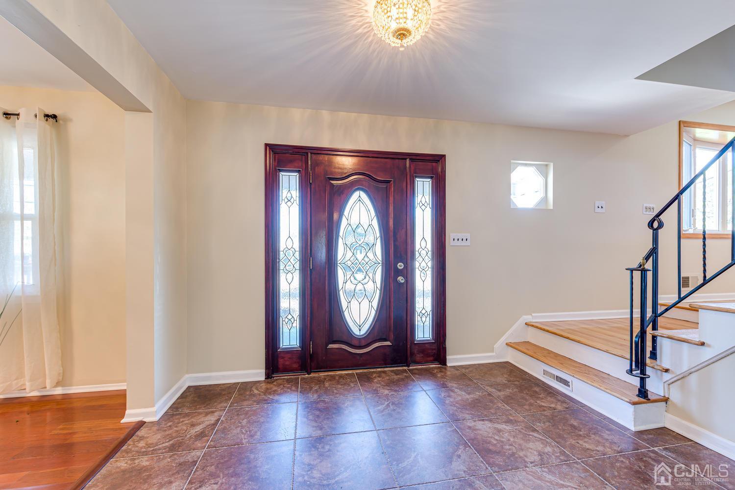 799 New Dover Road Edison, NJ 08820 - Photo 6 of 54 a view of an entryway with wooden floor