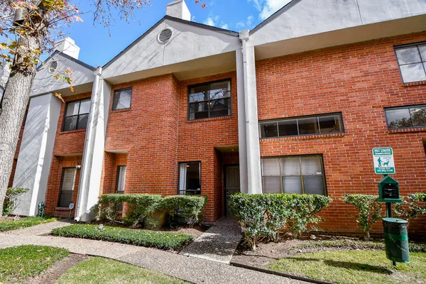 a front view of a multi story residential apartment building