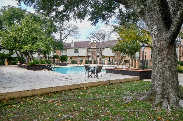 a view of a house with a swimming pool