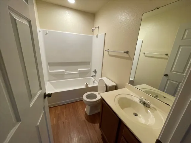 a bathroom with a sink and a tub