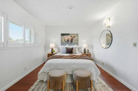 a room with a sink and a mirror