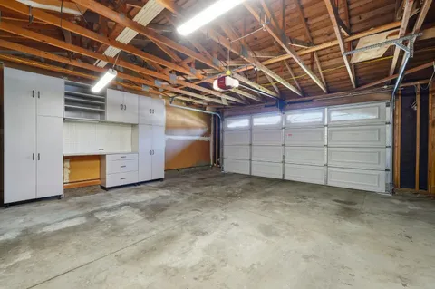 a view of a backyard with a sitting area and furniture