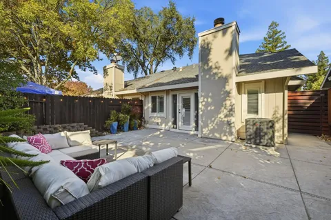a view of a dinning tables and chair in the patio