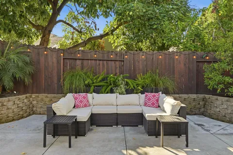 an aerial view of a house with a garden
