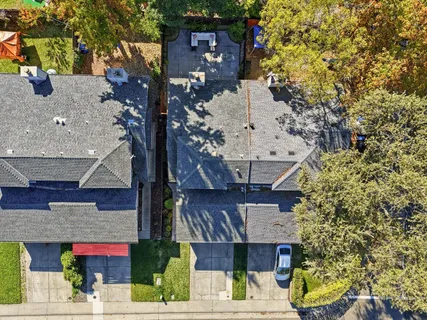 a view of a backyard with sitting area
