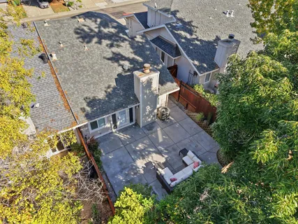 an aerial view of a city with lots of residential buildings
