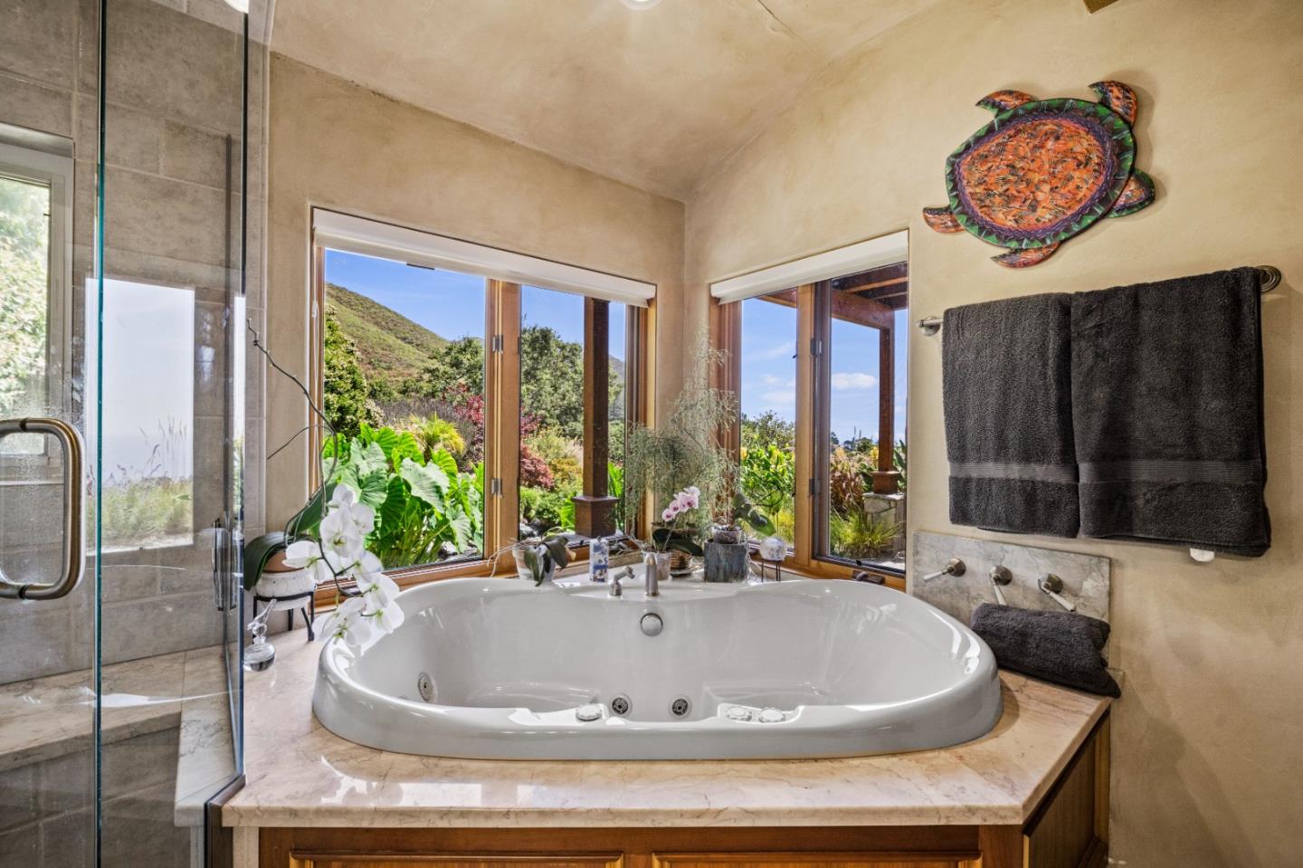 24 Mentone Road Carmel, CA 93923 - Photo 14 of 24 a bath tub sitting in front of a window
