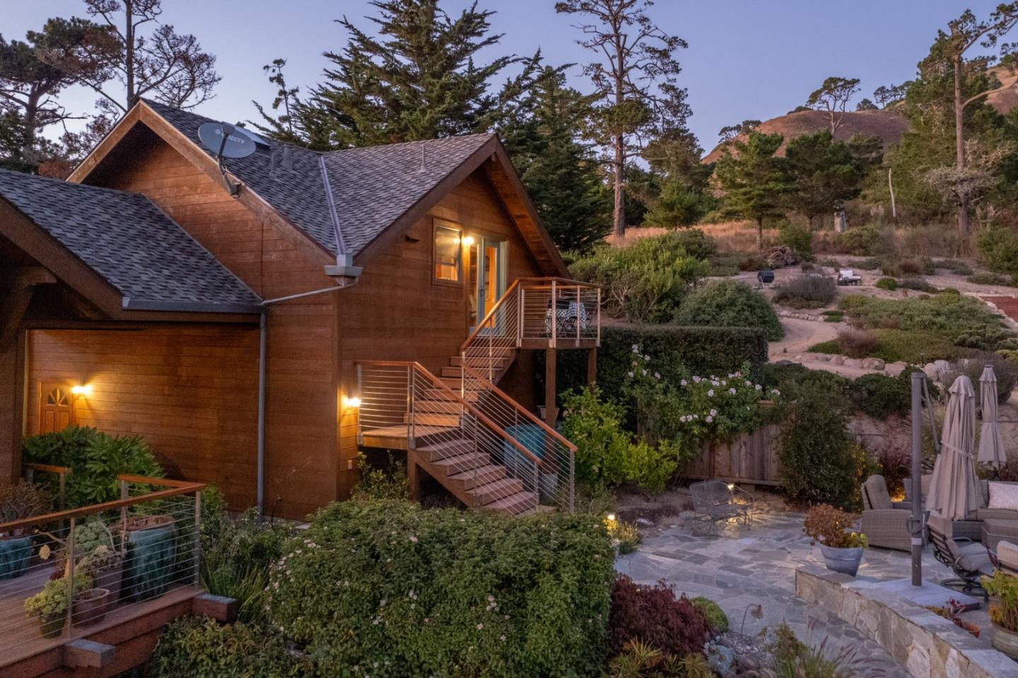 24 Mentone Road Carmel, CA 93923 - Photo 18 of 24 a view of a house with a yard