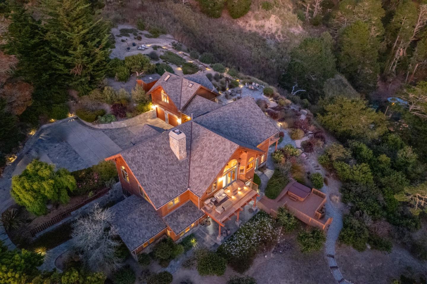 24 Mentone Road Carmel, CA 93923 - Photo 23 of 24 an aerial view of a house with a yard and lake