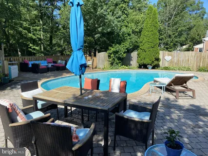 a view of outdoor sitting area with furniture