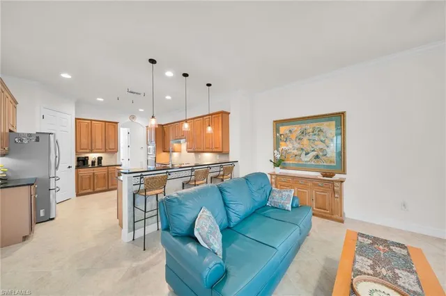 a view of swimming pool with outdoor seating