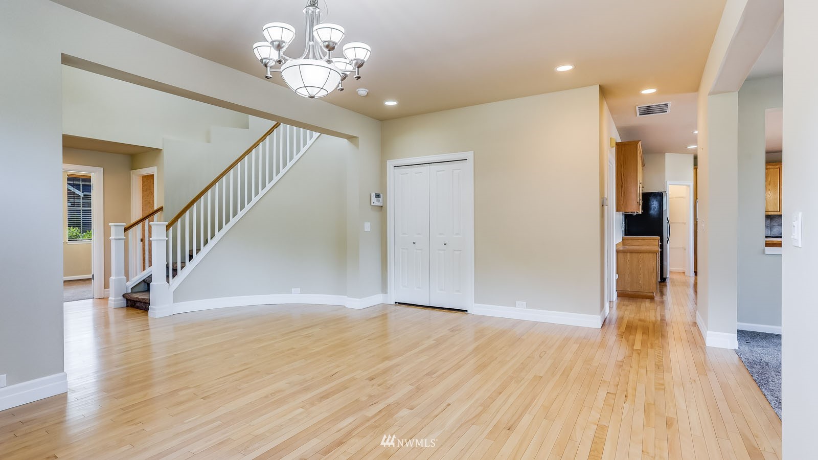 16458 Southeast 166th Terrace Renton, WA 98058 - Photo 14 of 40 a view of entryway with wooden floor
