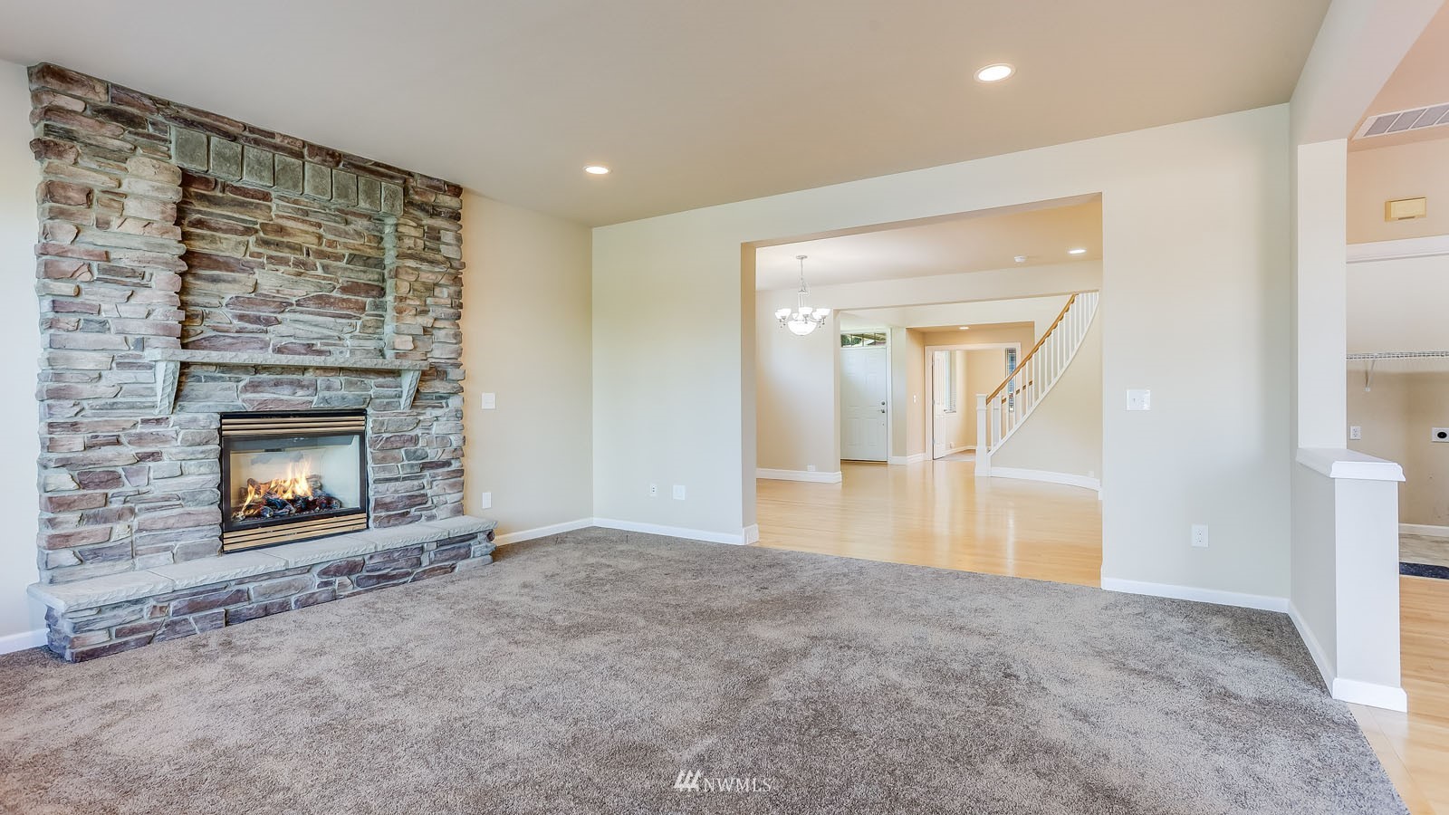 16458 Southeast 166th Terrace Renton, WA 98058 - Photo 17 of 40 a view of empty room with a fireplace