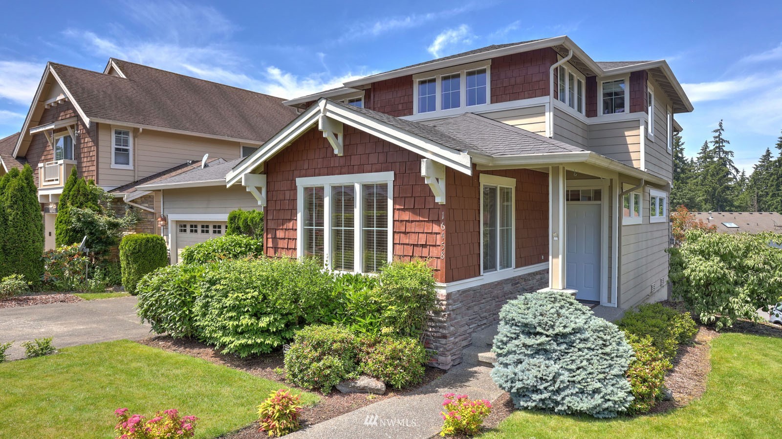 16458 Southeast 166th Terrace Renton, WA 98058 - Photo 2 of 40 front view of a house with a yard