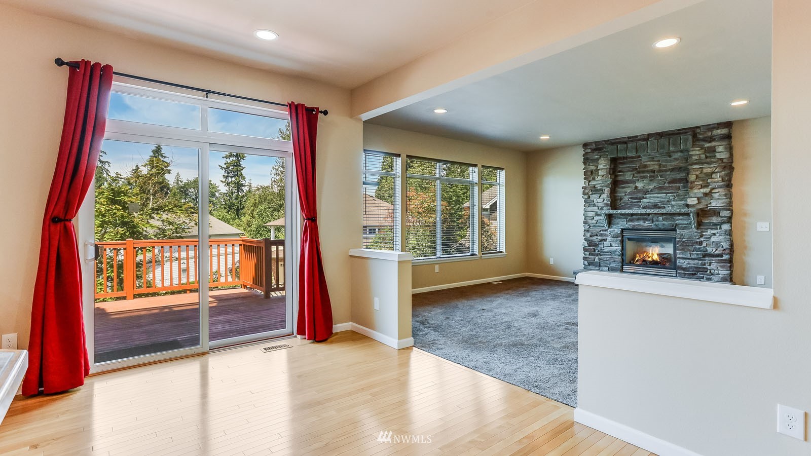 16458 Southeast 166th Terrace Renton, WA 98058 - Photo 24 of 40 wooden floor in an empty room with a fireplace