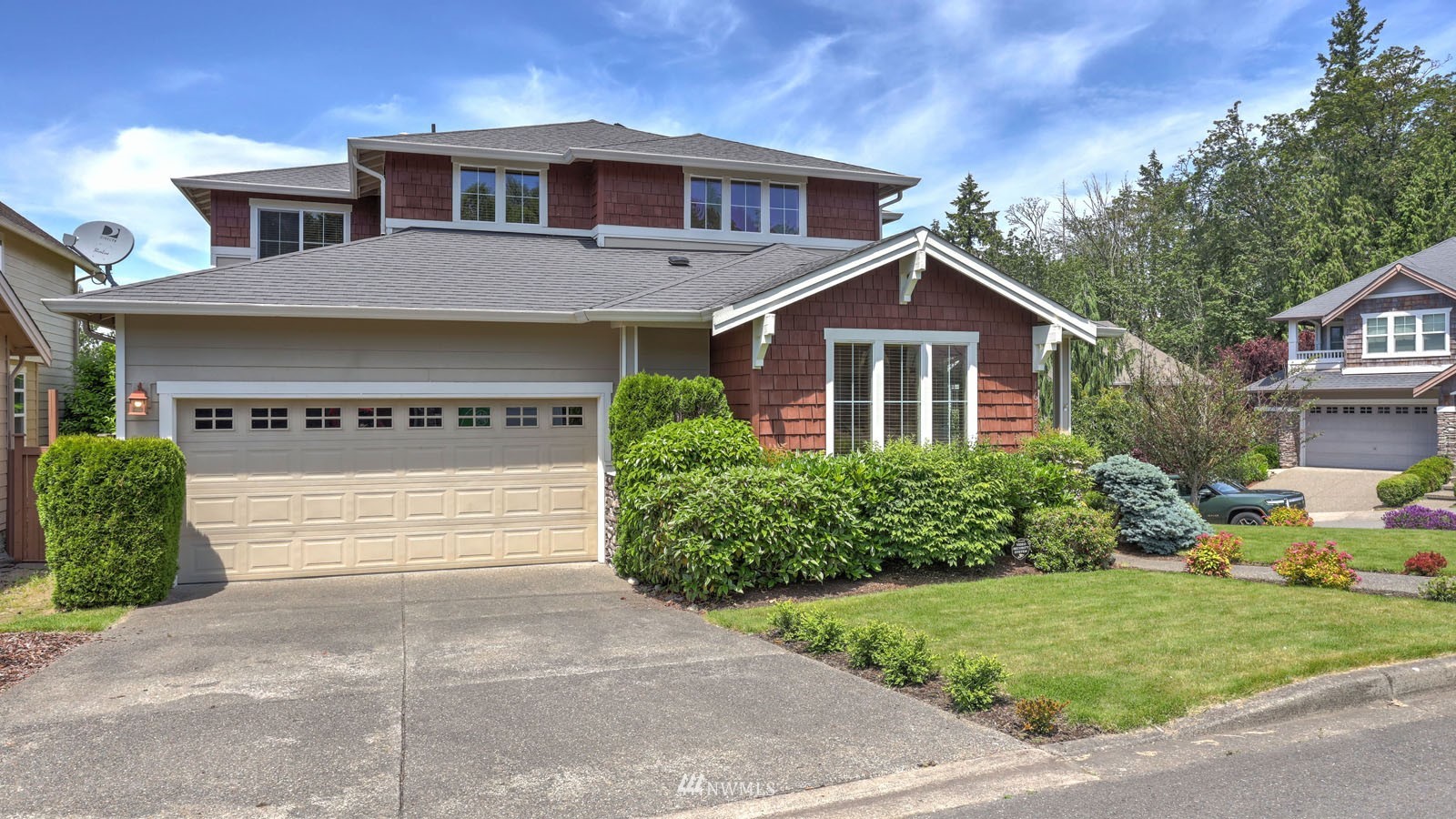16458 Southeast 166th Terrace Renton, WA 98058 - Photo 3 of 40 a front view of a house with a yard