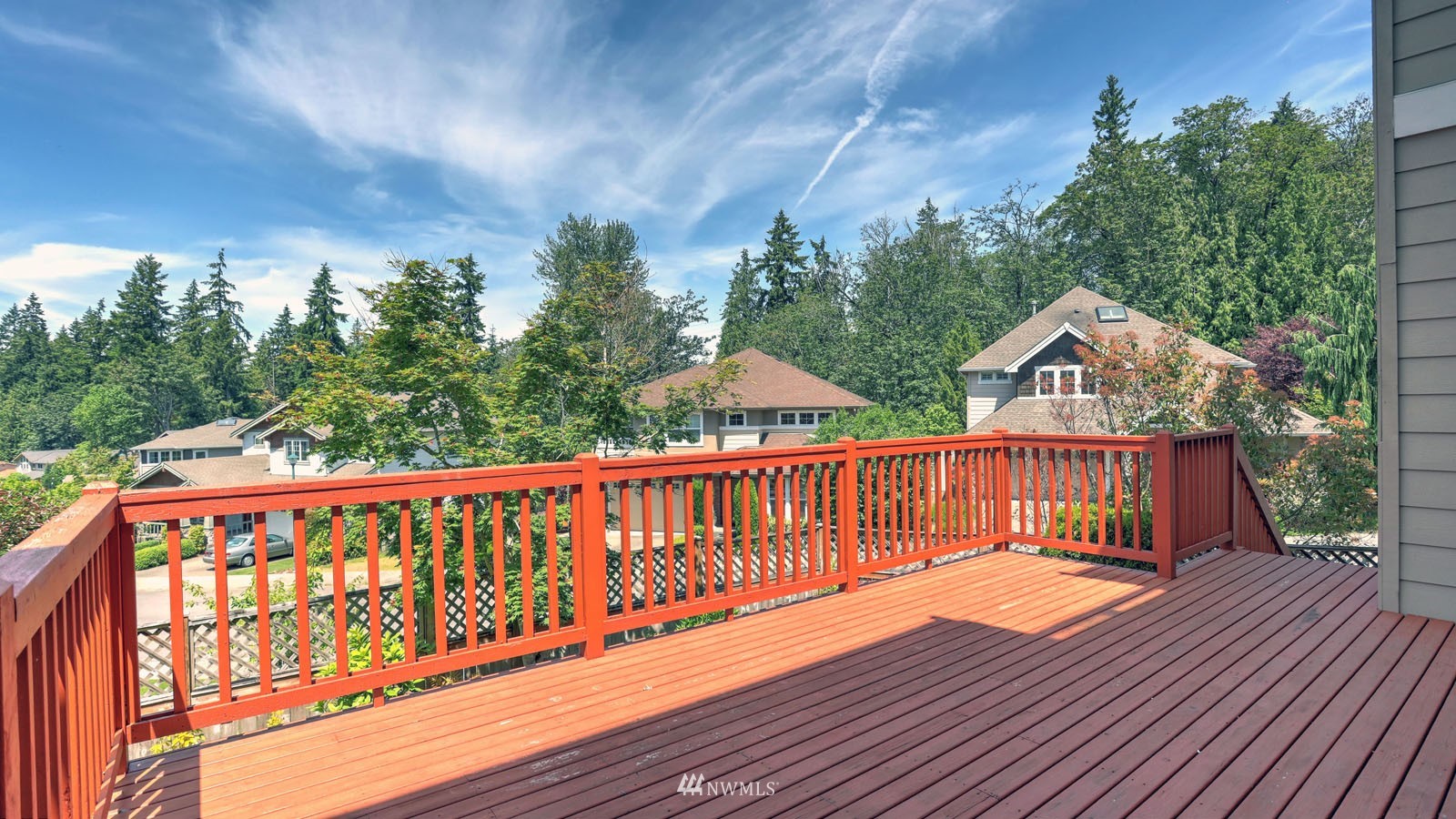 16458 Southeast 166th Terrace Renton, WA 98058 - Photo 36 of 40 a view of wooden deck with a yard and wooden fence