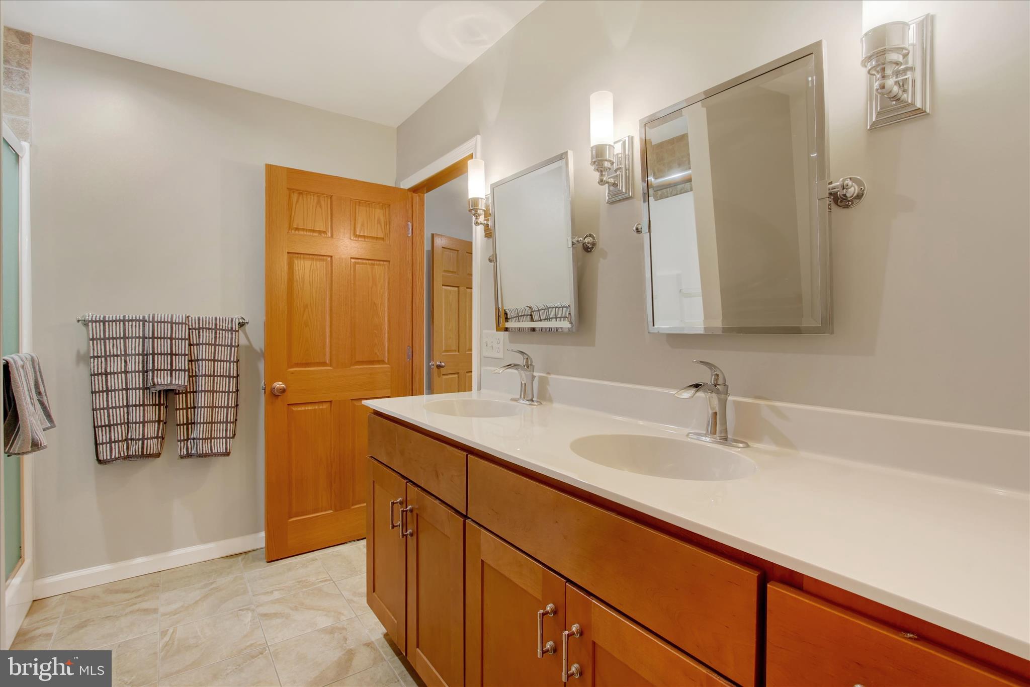 1855 Westwood Road York, PA 17403 - Photo 34 of 60 a bathroom with a sink and a mirror