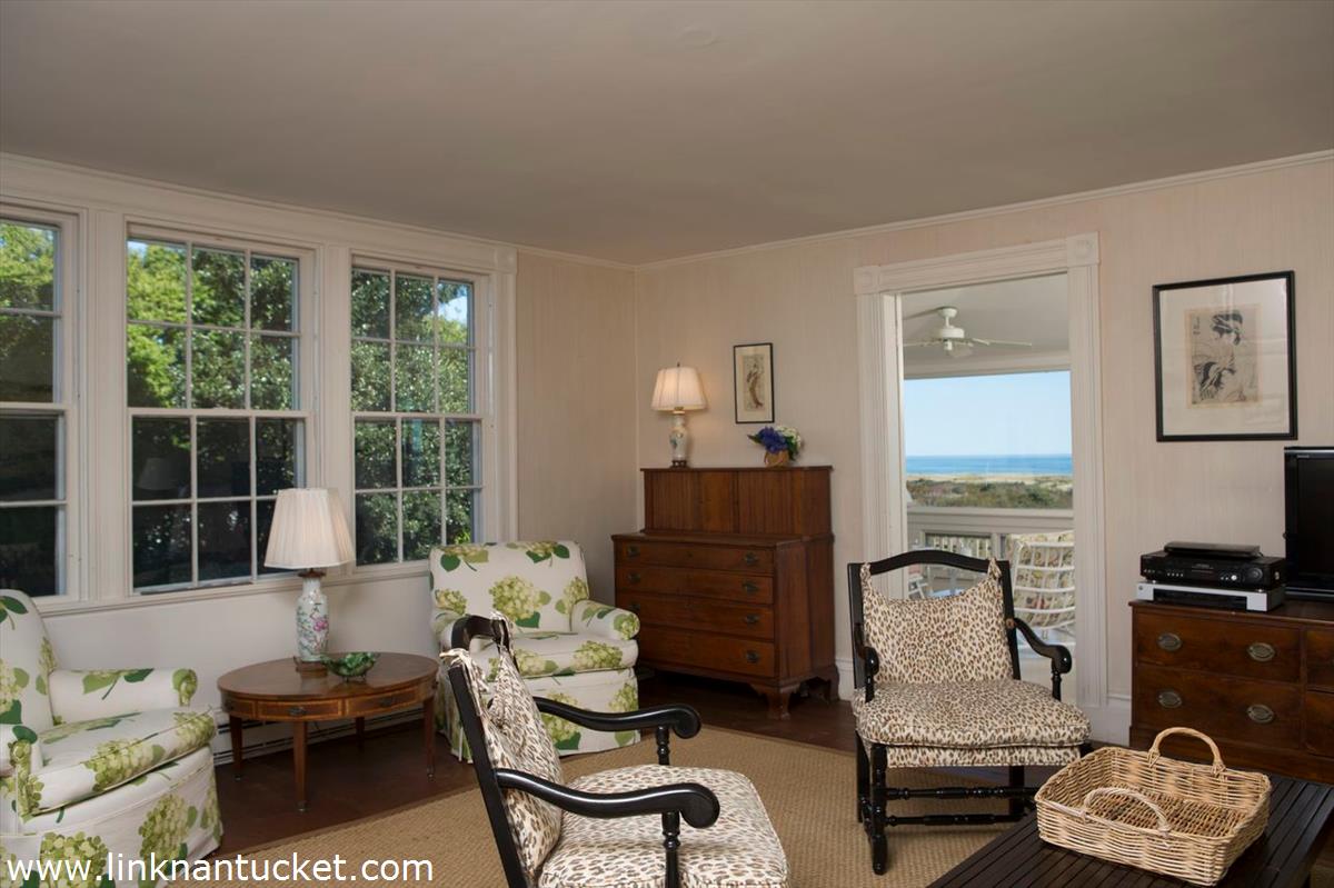 47 Cliff Road Nantucket, MA 02554 - Photo 19 of 22 a living room with furniture and a window