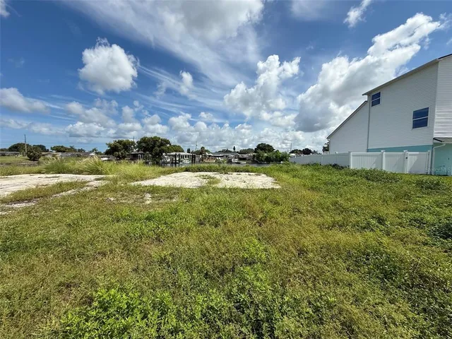 a view of a golf course with a lake