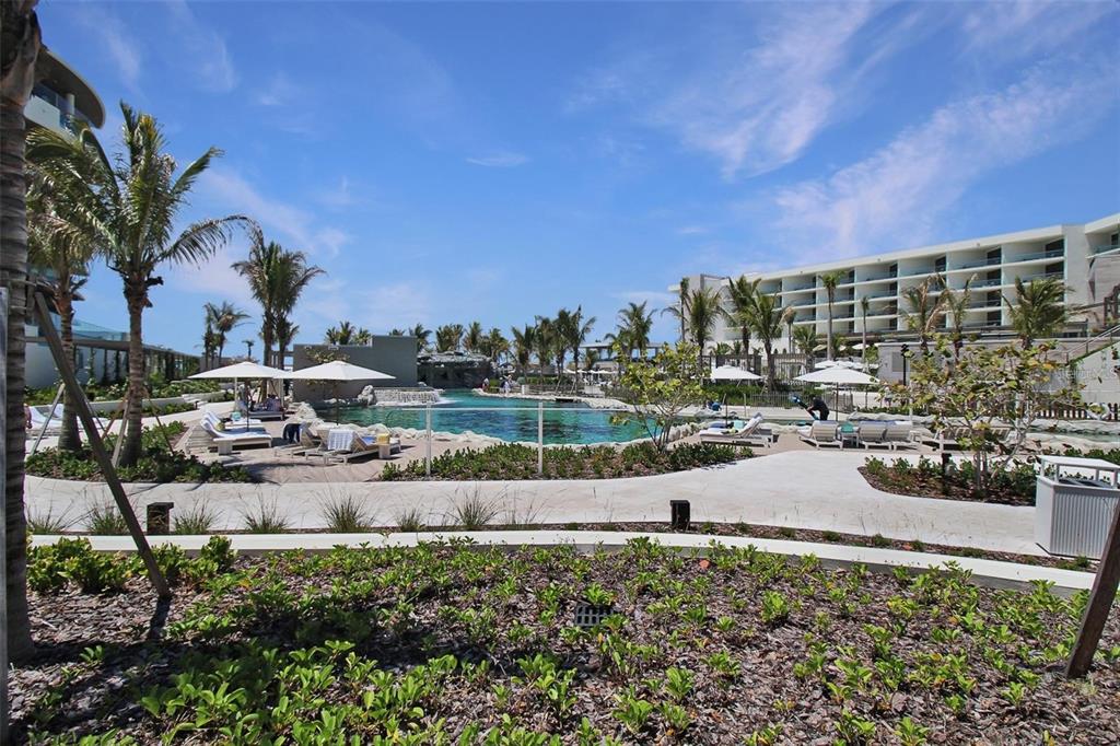 1581 Gulf Of Mexico Drive, Unit 307 Longboat Key, FL 34228 - Photo 45 of 83 a view of a water fountain and a big yard