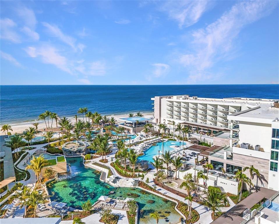 1581 Gulf Of Mexico Drive, Unit 307 Longboat Key, FL 34228 - Photo 80 of 83 an aerial view of residential building and ocean view