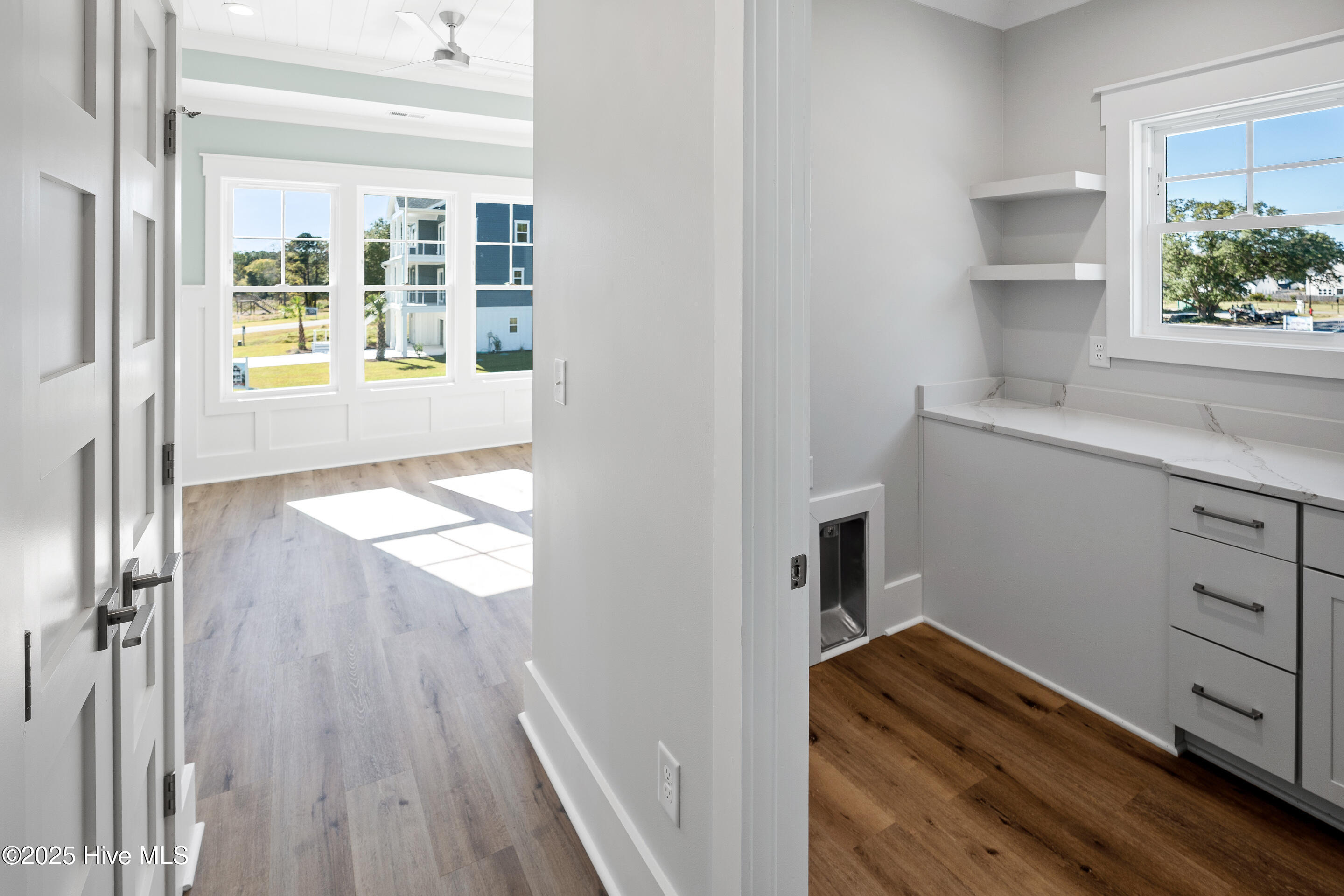 141 Bethea Street Holly Ridge, NC 28445 - Photo 23 of 59 laundry and office/dining room entrance