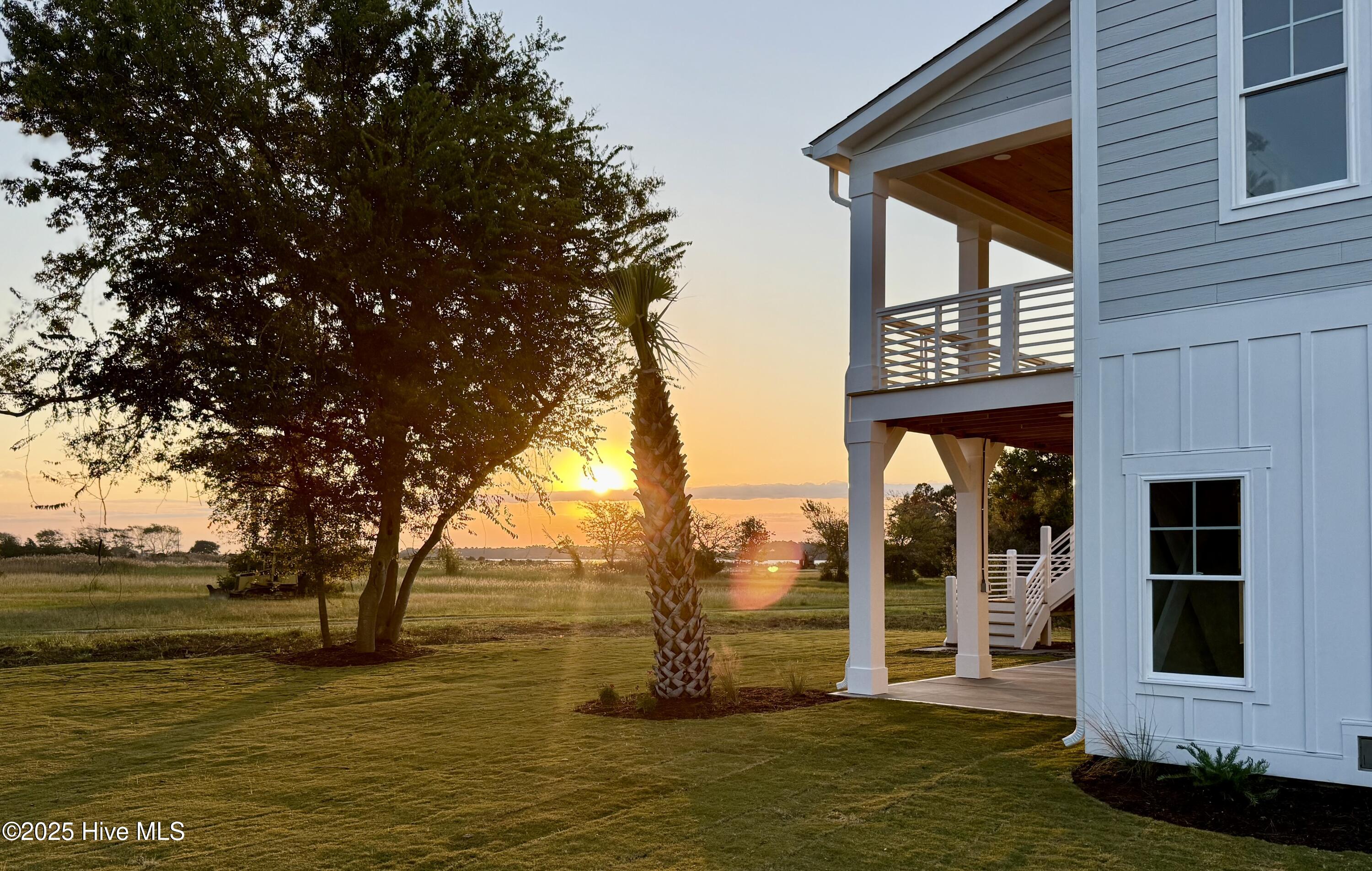 141 Bethea Street Holly Ridge, NC 28445 - Photo 58 of 59 backyard sunrise shot