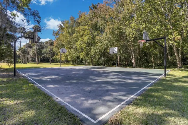 an aerial view of a swimming pool and outdoor space