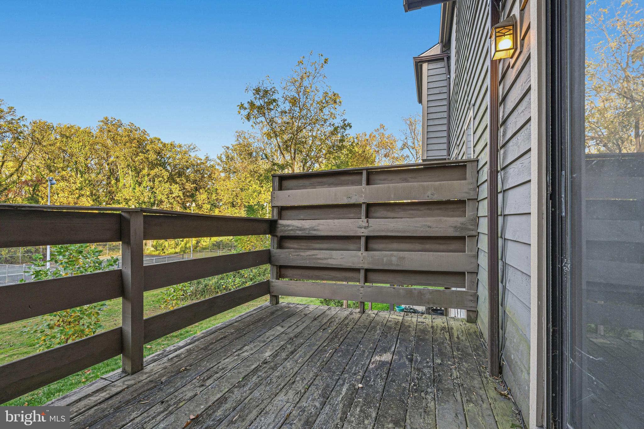 6 Stone Ridge Court, Unit 29 Baltimore, MD 21239 - Photo 21 of 26 a view of outdoor space with deck