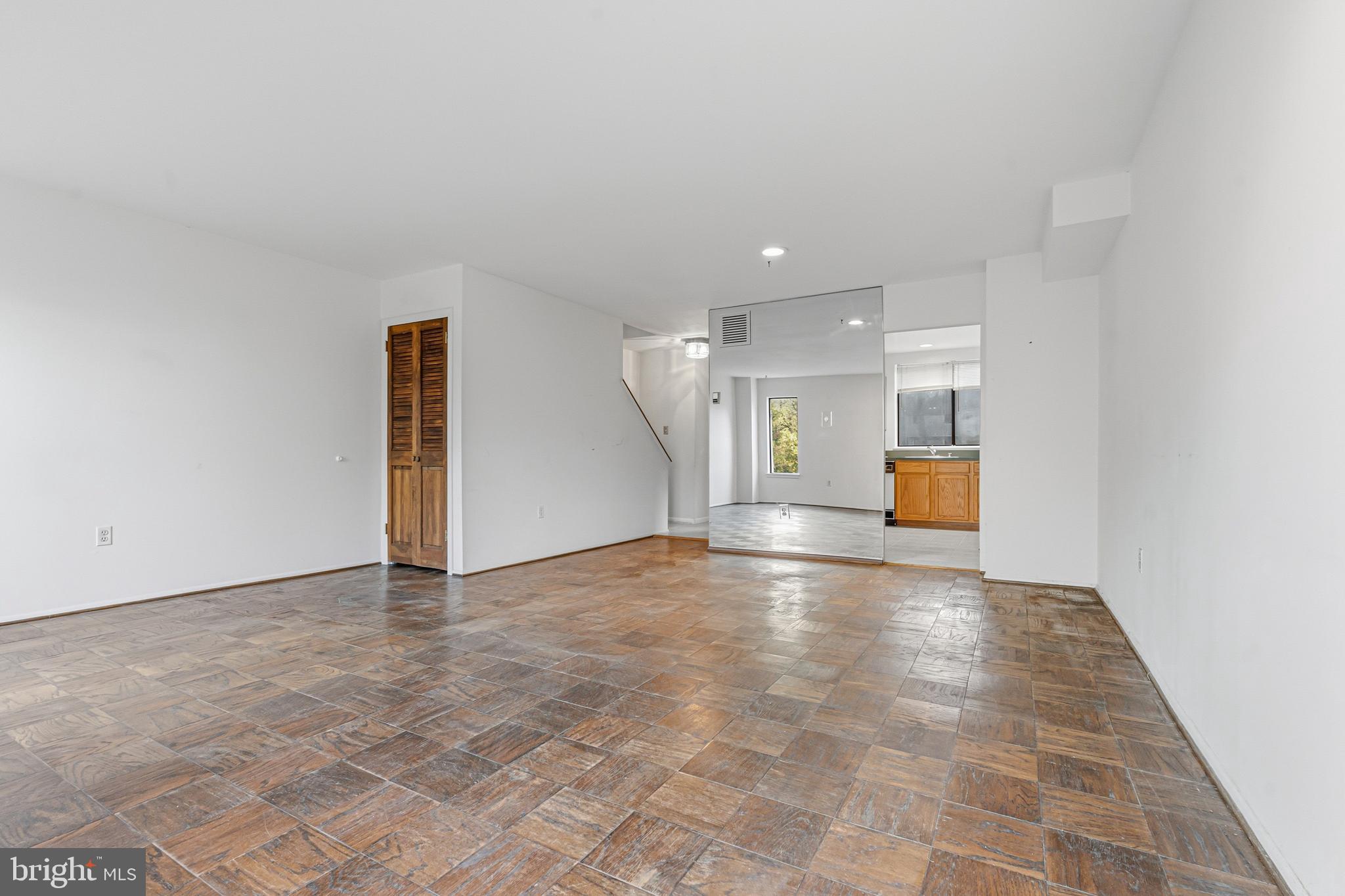 6 Stone Ridge Court, Unit 29 Baltimore, MD 21239 - Photo 10 of 26 a view of empty room with a kitchen