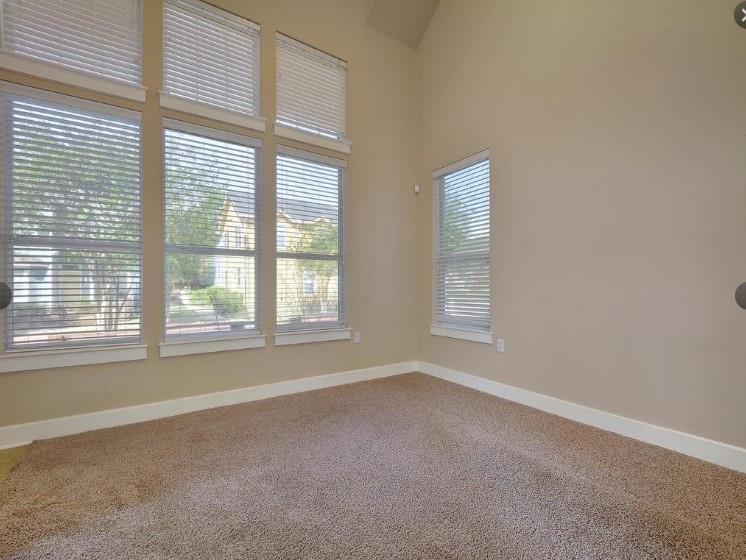 1601 Miriam Avenue, Unit 203 Austin, TX 78702 - Photo 11 of 29 an empty room with a window