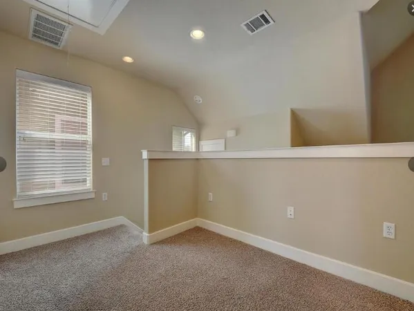 a view of a hallway with entryway