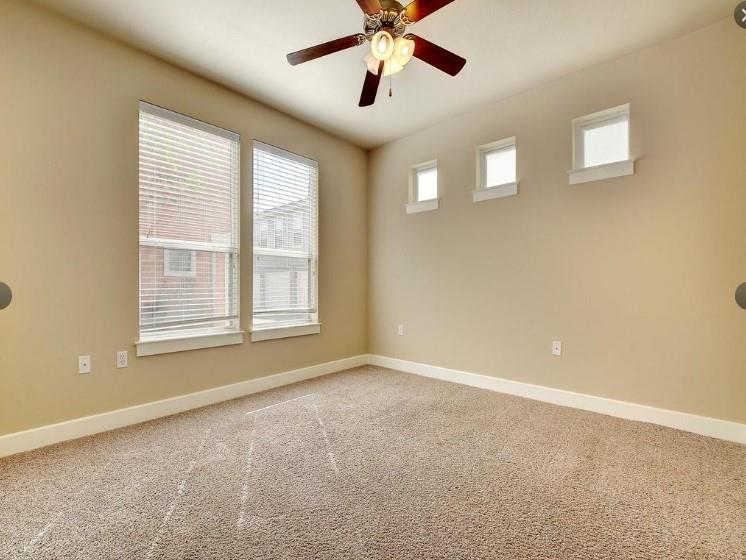 1601 Miriam Avenue, Unit 203 Austin, TX 78702 - Photo 16 of 29 a view of an empty room with a window