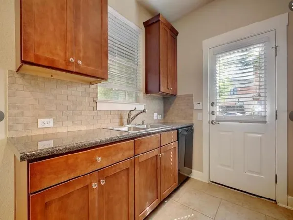 a bathroom with a sink and a bathtub