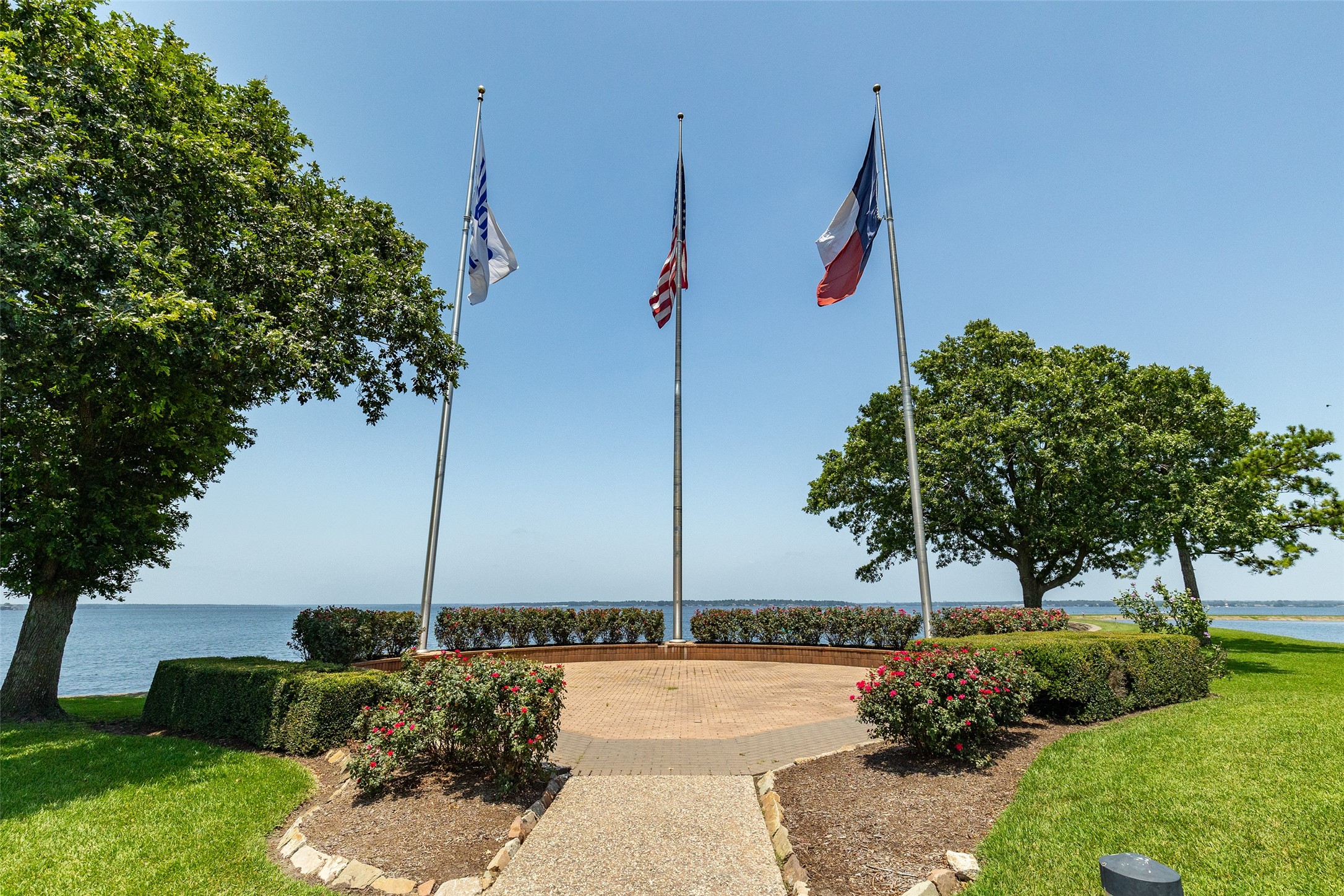 3721 Poets Court Montgomery, TX 77356 - Photo 28 of 29 Flags on the Walden point lake side