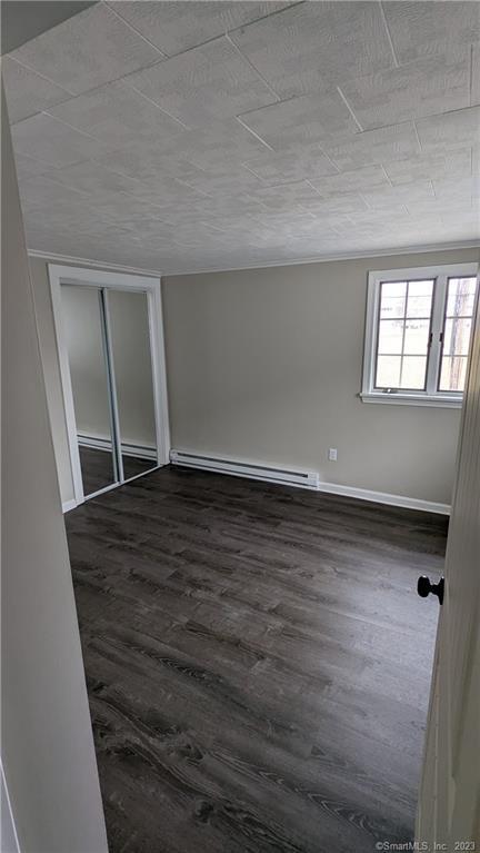 134 Bristol Street, Unit 2 Southington, CT 06489 - Photo 3 of 12 wooden floor in an empty room