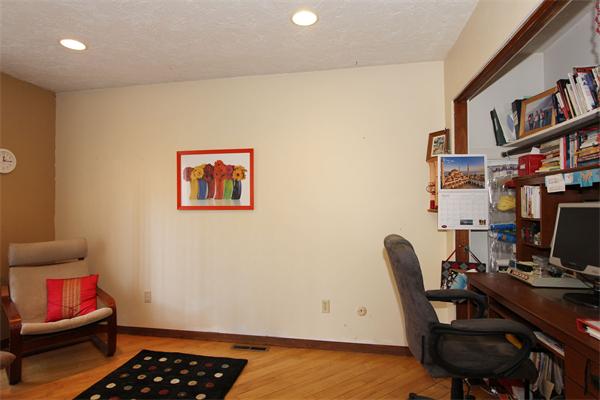 6 White Road Wayland, MA 01778 - Photo 12 of 24 a view of a workspace with furniture and bookshelf