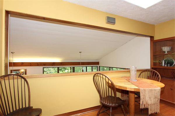 6 White Road Wayland, MA 01778 - Photo 16 of 24 a view of a chairs and table in a balcony