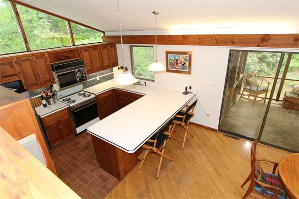 6 White Road Wayland, MA 01778 - Photo 18 of 24 a room with wooden floor table and chairs