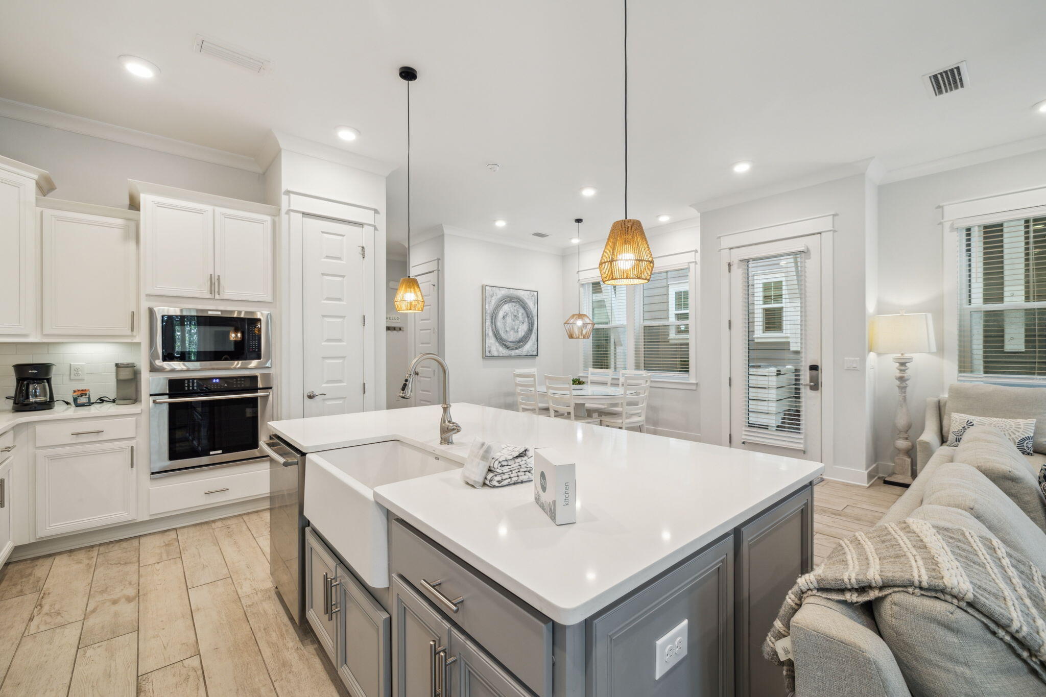 309 Milestone Dr Inlet Beach, Unit A Inlet Beach, FL 32461 - Photo 14 of 54 a kitchen with stainless steel appliances granite countertop a sink a stove and a refrigerator