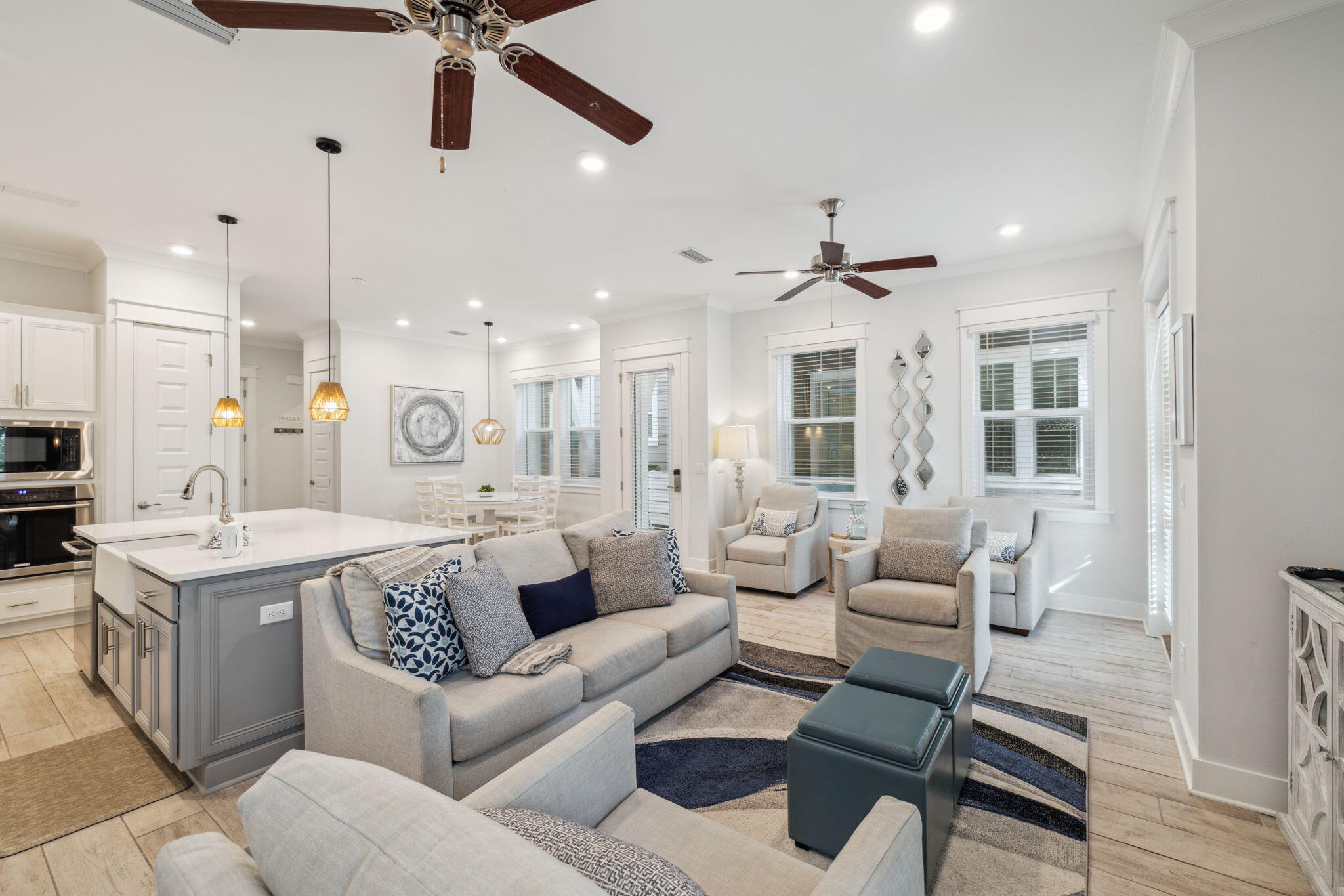 309 Milestone Dr Inlet Beach, Unit A Inlet Beach, FL 32461 - Photo 2 of 54 a living room with furniture and a ceiling fan