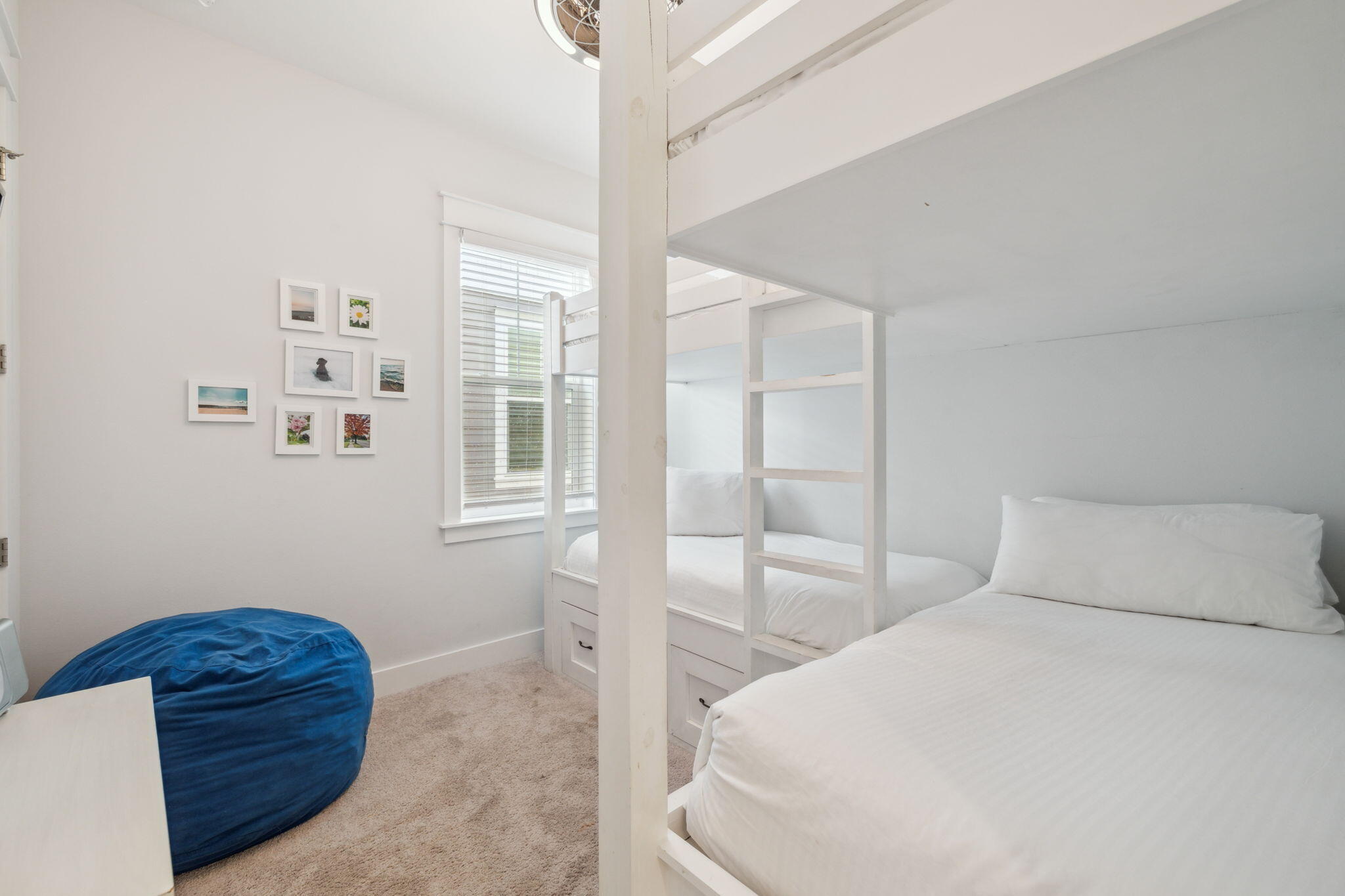 309 Milestone Dr Inlet Beach, Unit A Inlet Beach, FL 32461 - Photo 22 of 54 a bedroom with a bed and a window