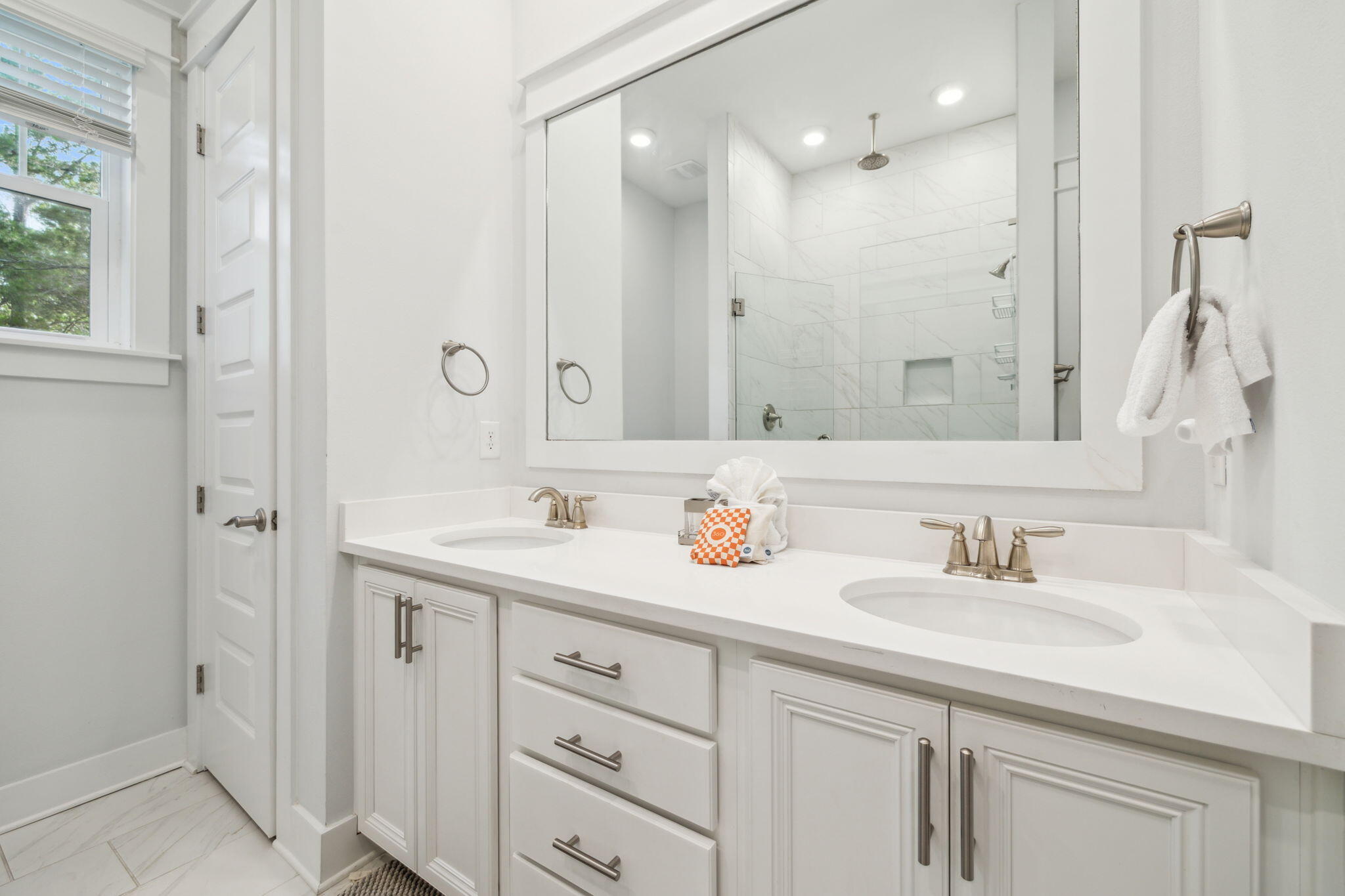 309 Milestone Dr Inlet Beach, Unit A Inlet Beach, FL 32461 - Photo 29 of 54 a bathroom with double sink and a mirror