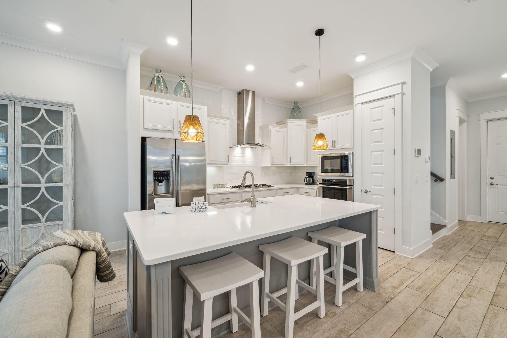 309 Milestone Dr Inlet Beach, Unit A Inlet Beach, FL 32461 - Photo 3 of 54 a kitchen with stainless steel appliances kitchen island granite countertop a sink a refrigerator and a refrigerator