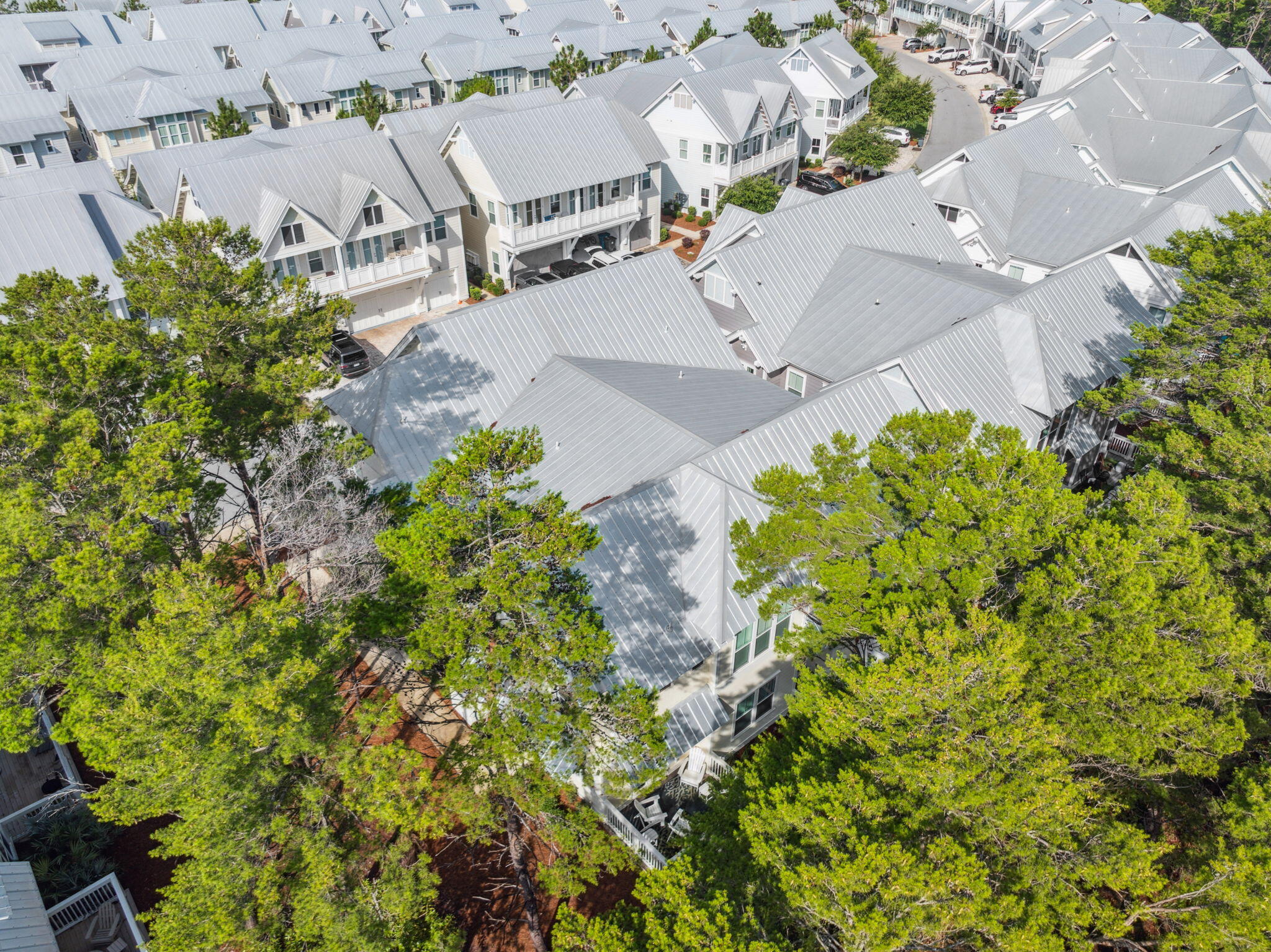 309 Milestone Dr Inlet Beach, Unit A Inlet Beach, FL 32461 - Photo 38 of 54 an aerial view of residential house with outdoor space and trees all around