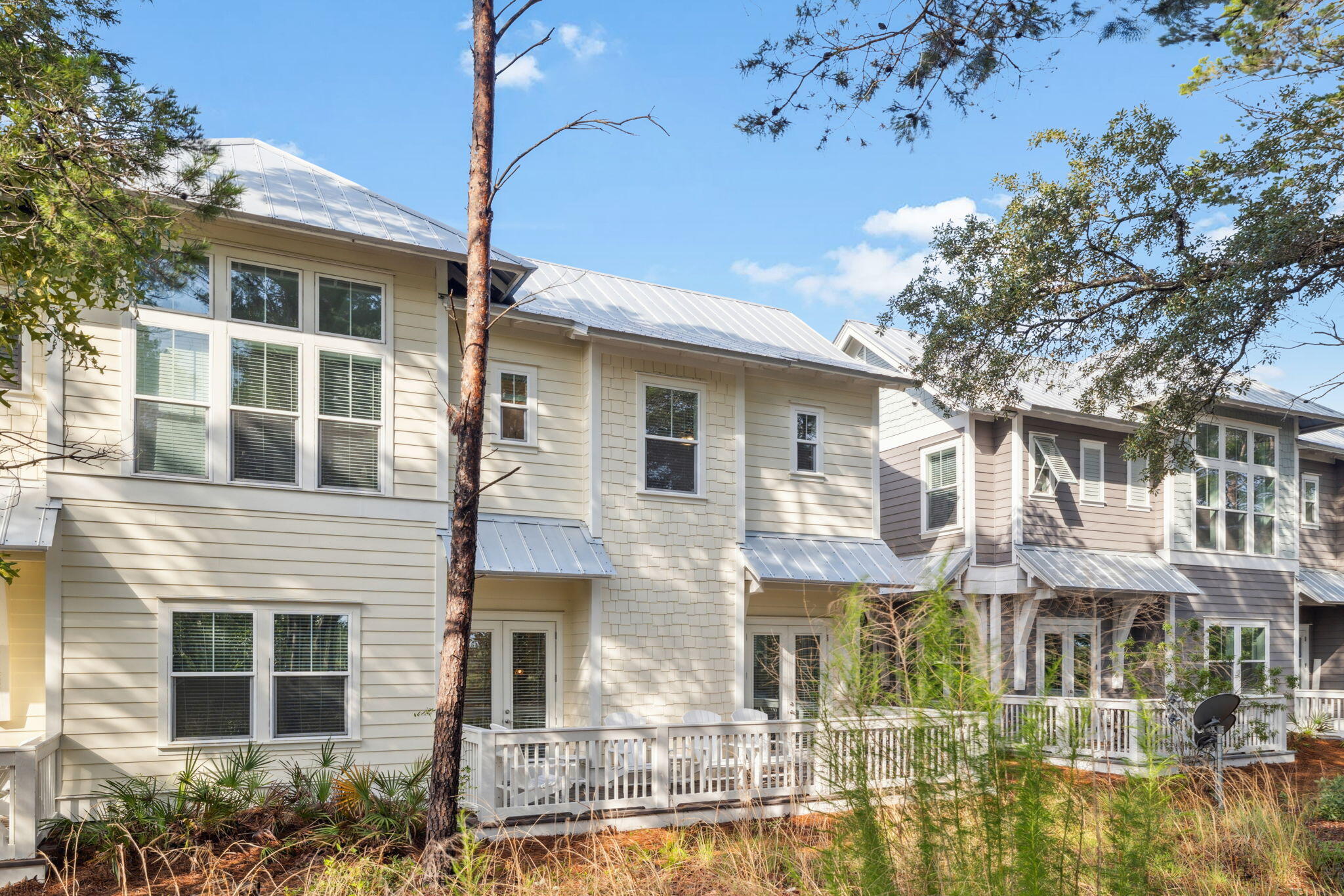 309 Milestone Dr Inlet Beach, Unit A Inlet Beach, FL 32461 - Photo 45 of 54 a front view of a building with balcony