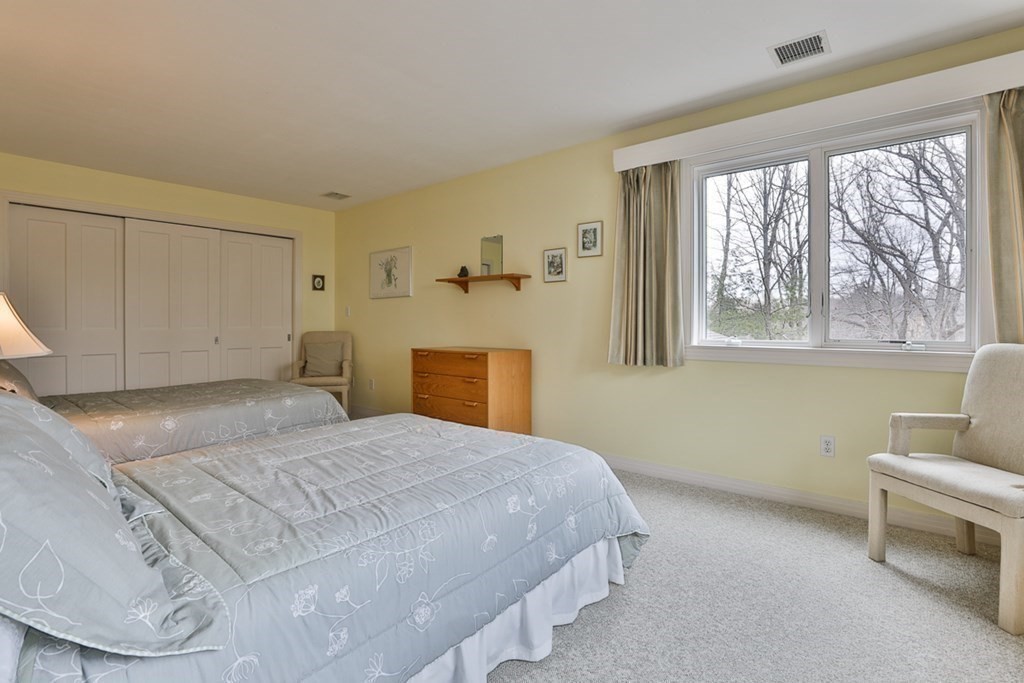 68 Slough Road Harvard, MA 01451 - Photo 25 of 35 a bedroom with a bed and a couch